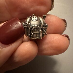 The palace of Amber sterling silver pumpkin cottage retired.